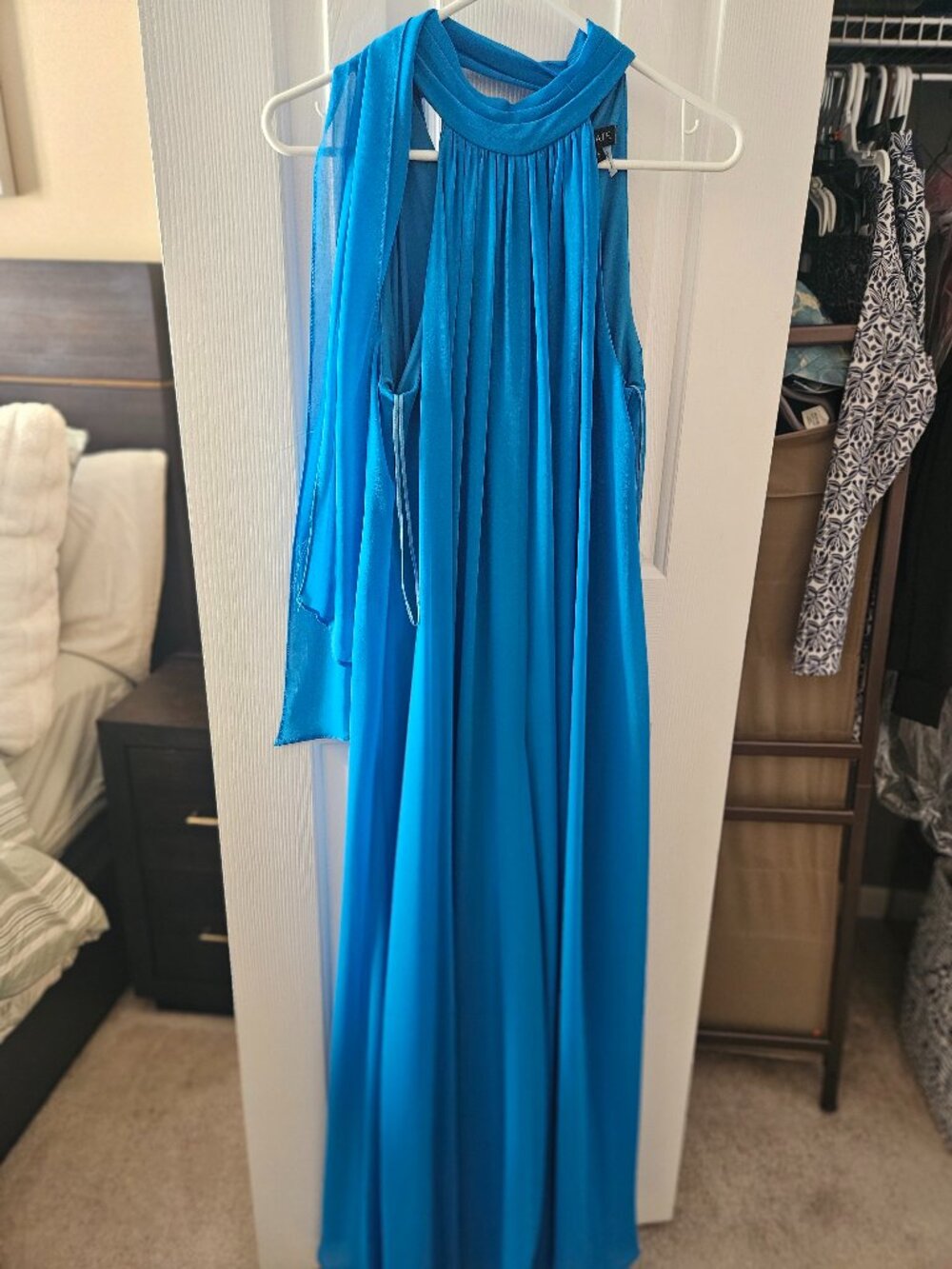 Blue chiffon jumpsuit with flared legs